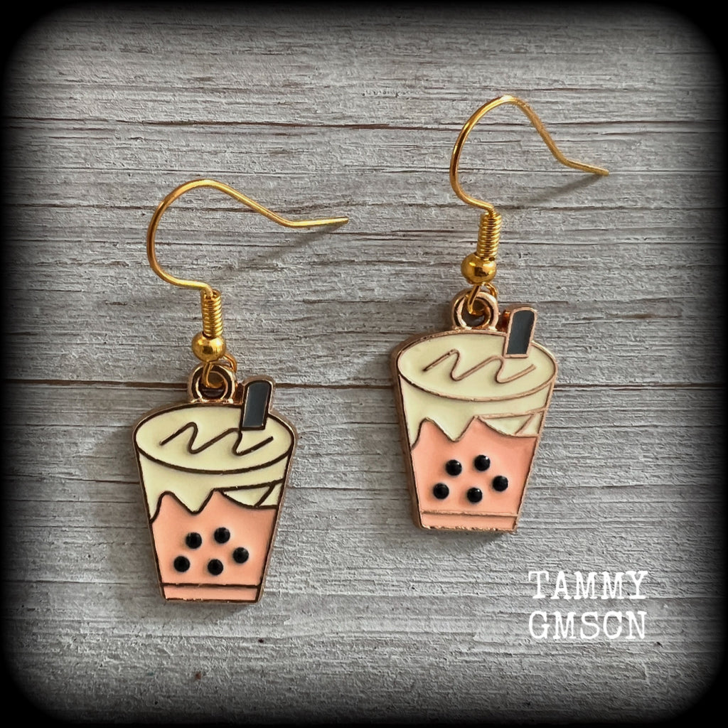 This pair of yummy earrings feature cute little bubble tea charms, measuring approx 4cms from tip to tip and weighing only a few grams each.  This pair have been made on antique gold french hooks, suitable for pierced ears.