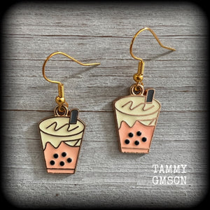 This pair of yummy earrings feature cute little bubble tea charms, measuring approx 4cms from tip to tip and weighing only a few grams each.  This pair have been made on antique gold french hooks, suitable for pierced ears.