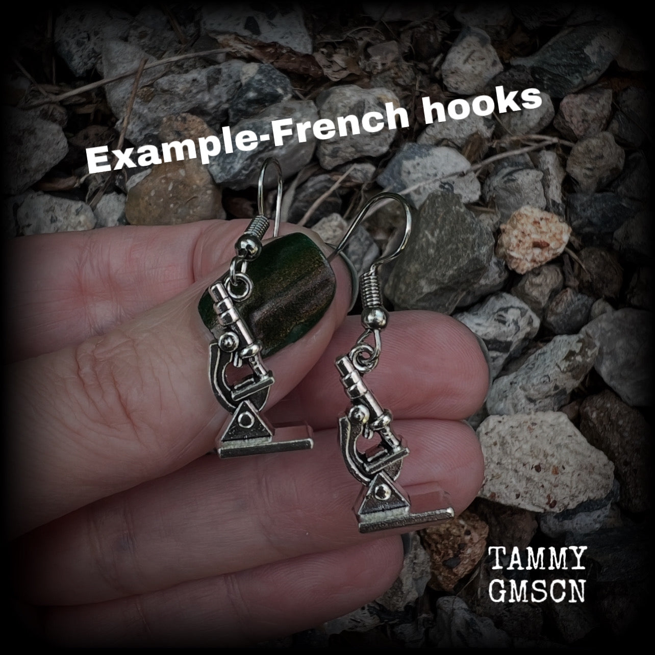 These earrings feature a pair of antique silver microscopes, measuring just on 4.5cms from tip to tip, and weighing only a few grams each.

This pair have been made with surgical steel french hooks, to be worn in pierced ears.