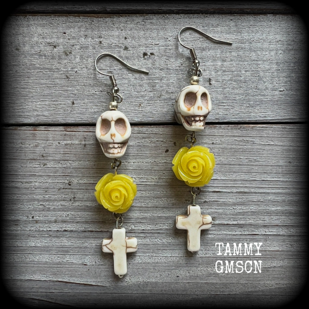 This pair of beautiful dangly earrings features gorgeous canary yellow roses with bone white howlite stone skulls and crosses.
Measuring just on 8.5cms from tip to tip and weighing approx 7 grams each, these are lovely and lightweight, and nice and dangly.

This pair have been made with stainless steel french hooks, for pierced ears.
