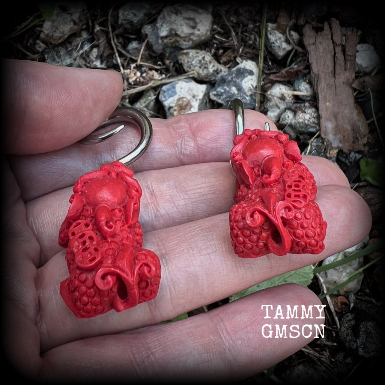 These gorgeous earrings feature stunning deep red Cinnabar Pi Xui lions, measuring just over 6cms from tip to tip, and weighing approx 9 grams each.

This pair has been made with 6 gauge (4mm) surgical steel full curl hooks, suitable for stretched lobes.
