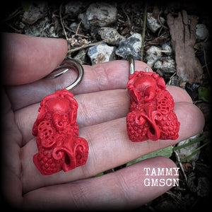 These gorgeous earrings feature stunning deep red Cinnabar Pi Xui lions, measuring just over 6cms from tip to tip, and weighing approx 9 grams each.

This pair has been made with 6 gauge (4mm) surgical steel full curl hooks, suitable for stretched lobes.
