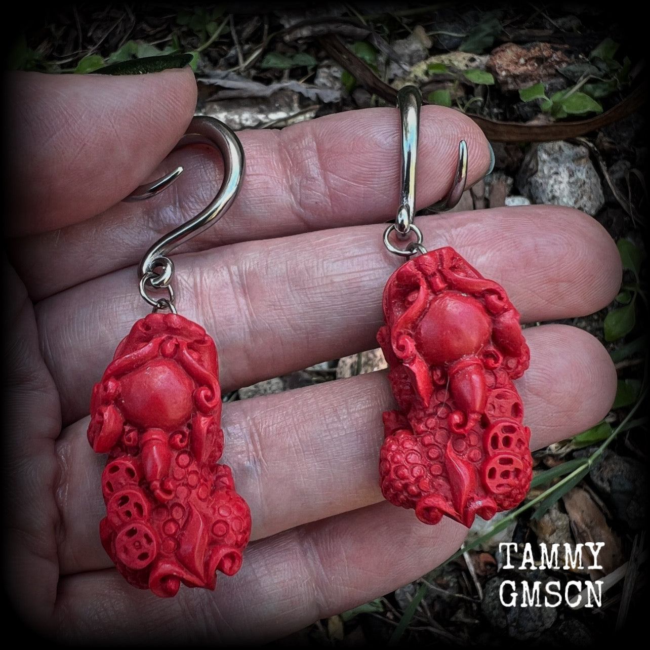 These gorgeous earrings feature stunning deep red Cinnabar Pi Xui lions, measuring just over 6cms from tip to tip, and weighing approx 9 grams each.

This pair has been made with 6 gauge (4mm) surgical steel full curl hooks, suitable for stretched lobes.
