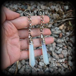 These gorgeous opalite earrings have been made with transluscent gemstone points, are nice and dangly measuring in at approx 10.5cms from tip to tip and not too heavy at 15 grams a piece. 
