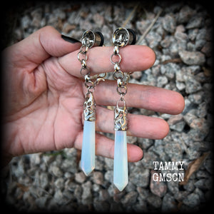 These gorgeous opalite earrings have been made with transluscent gemstone points, are nice and dangly measuring in at approx 10.5cms from tip to tip and not too heavy at 15 grams a piece. 
