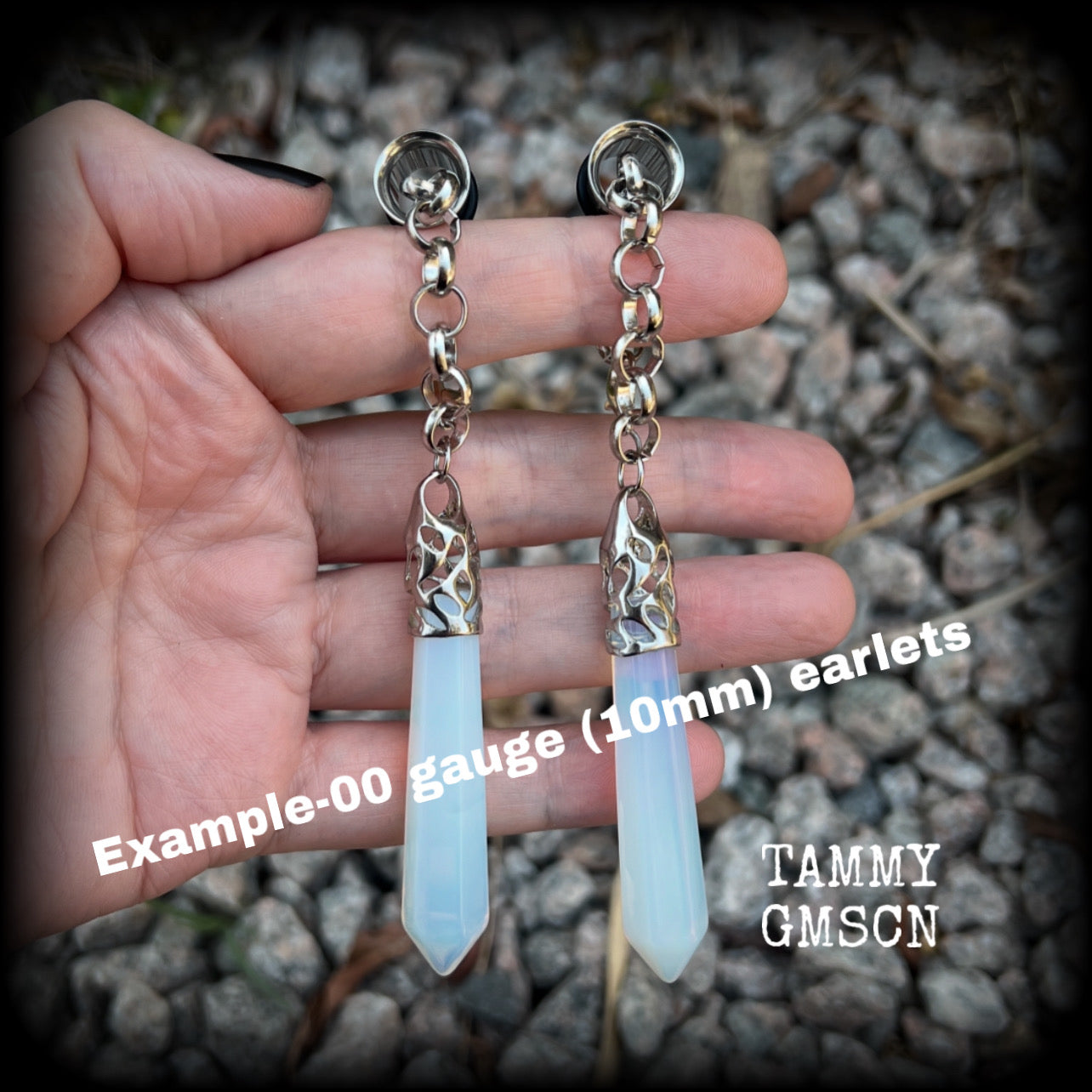 These gorgeous opalite earrings have been made with transluscent gemstone points, are nice and dangly measuring in at approx 10.5cms from tip to tip and not too heavy at 15 grams a piece. 
