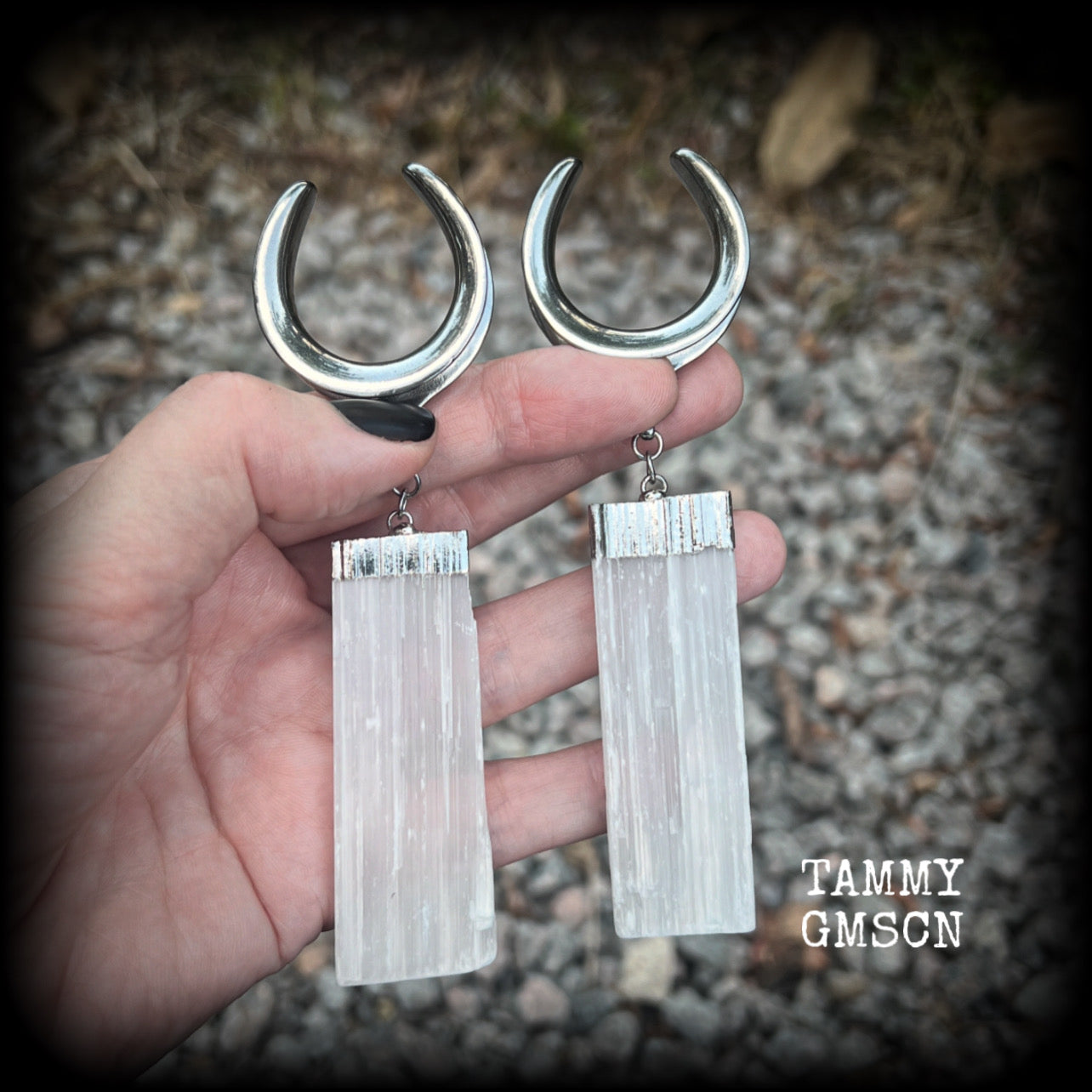 Featuring the biggest selenite pieces we could get our hands on, these earrings are big and beautiful, measuring just on 12cms from tip to tip, and weighing approx 33 grams each.

This pair have been made on 1.18” gauge (30mm) surgical steel cradles, to be worn in stretched lobes.