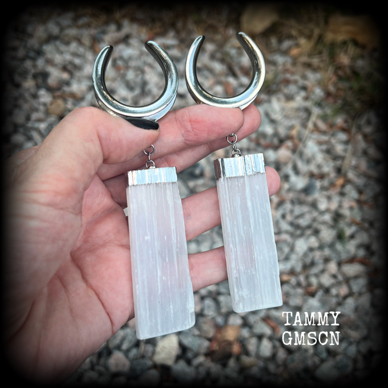 Featuring the biggest selenite pieces we could get our hands on, these earrings are big and beautiful, measuring just on 12cms from tip to tip, and weighing approx 33 grams each.

This pair have been made on 1.18” gauge (30mm) surgical steel cradles, to be worn in stretched lobes.