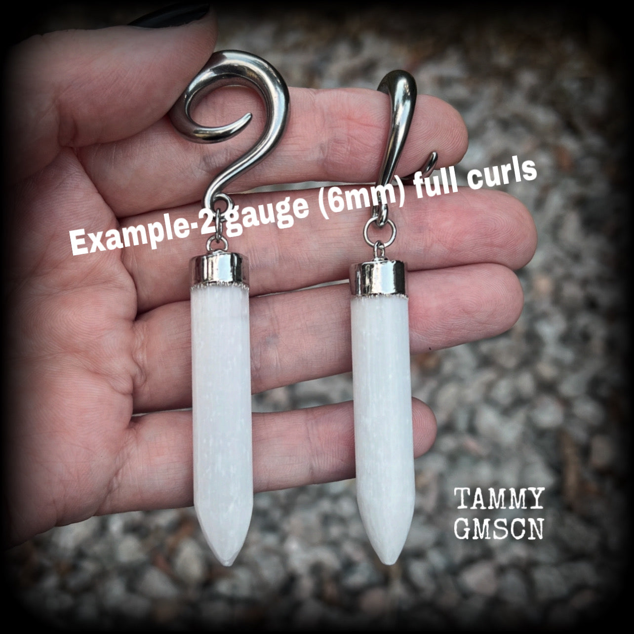 These beautiful gauged earrings feature gorgeous selenite points, measuring just over 9cms from tip to tip, and weighing approx 17 grams each.

This pair have been made on 2 gauge (6mm) surgical steel full curl hooks, to be worn in stretched lobes.