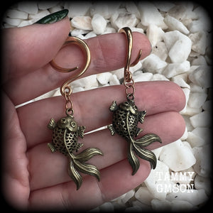 These gorgeous earrings feature antique bronze koi fish, super lightweight at approx. 6 grams each and measuring approx 6.5cms from tip to tip.

This pair have been made on 6 gauge (4mm) surgical steel full curls, suitable for stretched lobes.