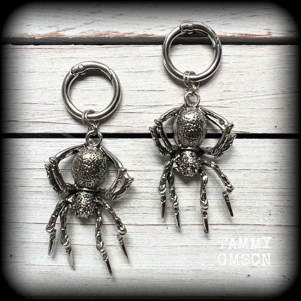 These gorgeous dangly earrings feature big antique silver spiders, measuring approx 9 cms from tip to tip, and weighing approx 24 grams a piece .

These earrings have been made on strong silver alloy snap hoop rings, to be worn in stretched lobes with silicone earlets from 2 gauge (6mm).