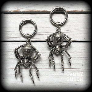 These gorgeous dangly earrings feature big antique silver spiders, measuring approx 9 cms from tip to tip, and weighing approx 24 grams a piece .

These earrings have been made on strong silver alloy snap hoop rings, to be worn in stretched lobes with silicone earlets from 2 gauge (6mm).