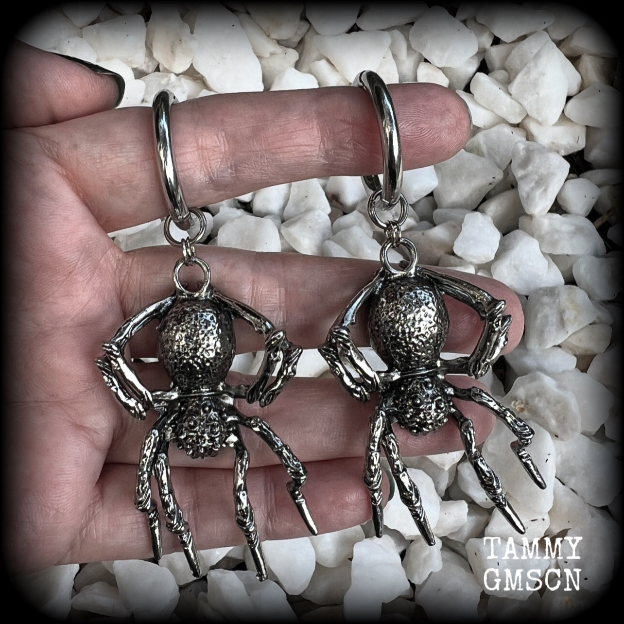 These gorgeous dangly earrings feature big antique silver spiders, measuring approx 9 cms from tip to tip, and weighing approx 24 grams a piece . 

These earrings have been made on strong silver alloy snap hoop rings, to be worn in stretched lobes with silicone earlets from 2 gauge (6mm).
