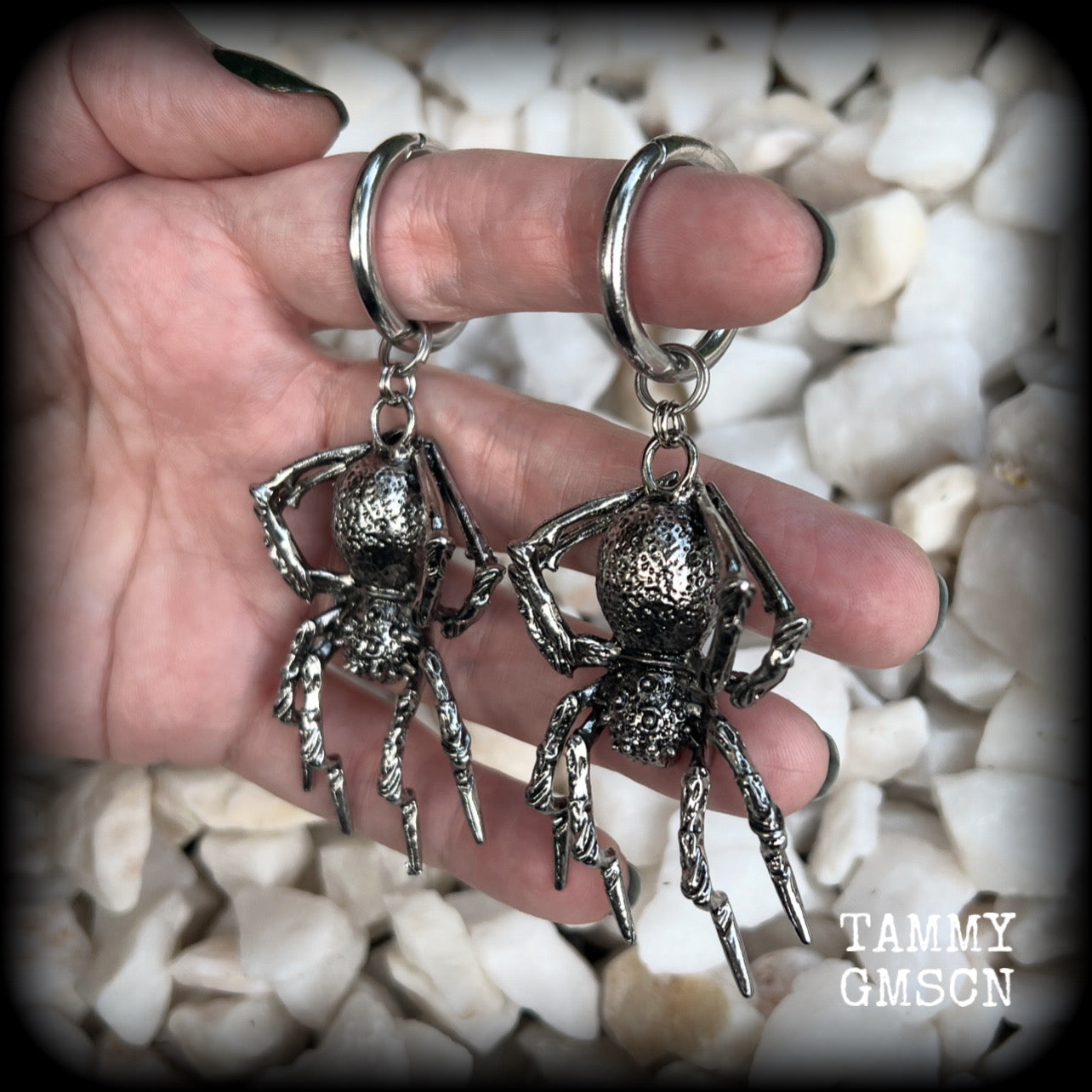 These gorgeous dangly earrings feature big antique silver spiders, measuring approx 9 cms from tip to tip, and weighing approx 24 grams a piece . 

These earrings have been made on strong silver alloy snap hoop rings, to be worn in stretched lobes with silicone earlets from 2 gauge (6mm).
