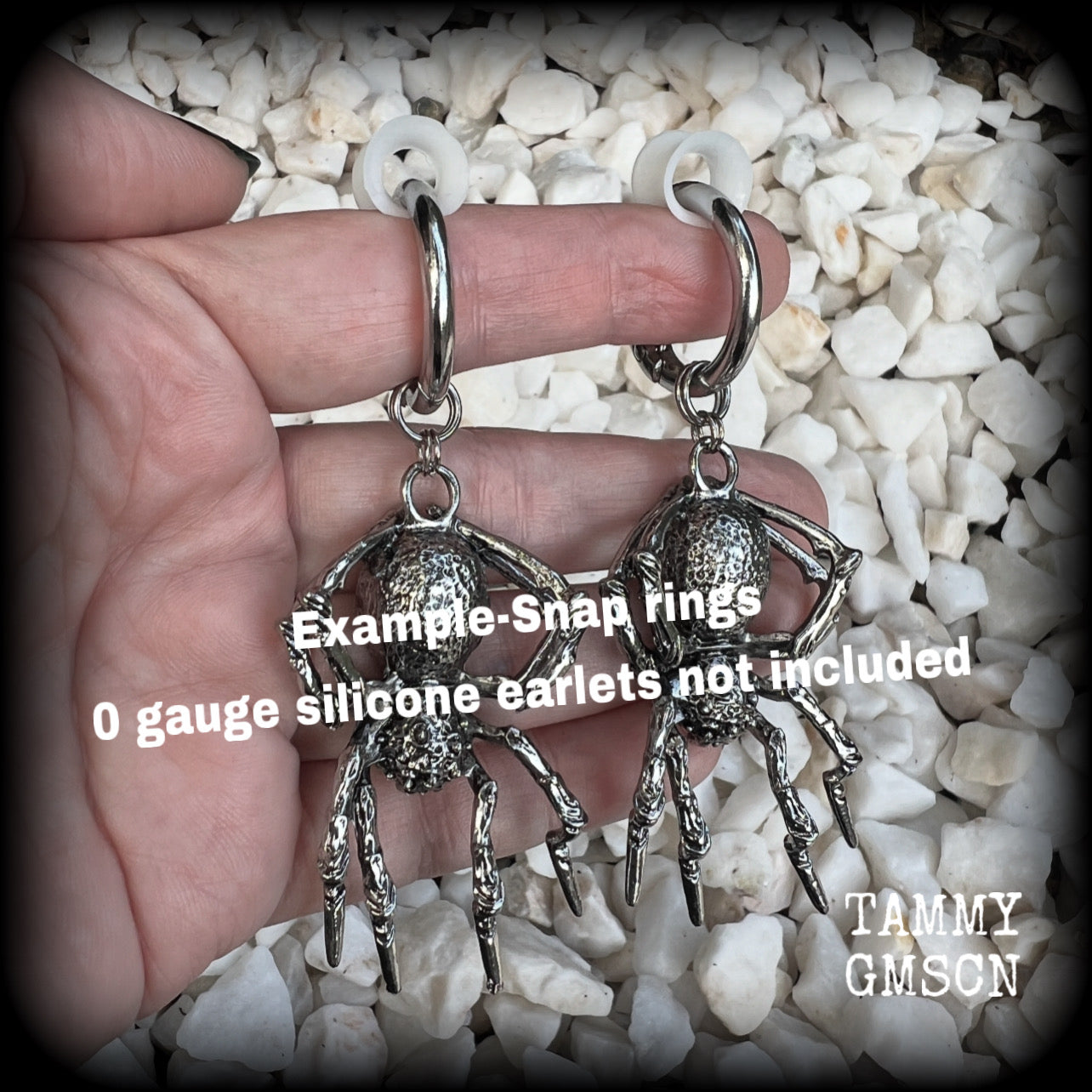 These gorgeous dangly earrings feature big antique silver spiders, measuring approx 9 cms from tip to tip, and weighing approx 24 grams a piece . 

These earrings have been made on strong silver alloy snap hoop rings, to be worn in stretched lobes with silicone earlets from 2 gauge (6mm).
