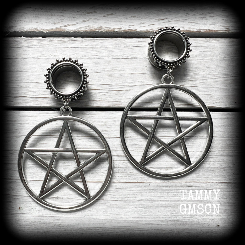 Featuring beautiful big antique silver pentagrams, these gorgeous witchy gauged earrings weigh in at 15 grams a piece, and are nice and dangly at 8cms from tip to tip.

This pair has been made on 5/8” gauge (16mm) surgical steel screw fit tunnels, to be worn in stretched lobes.