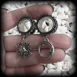 These gorgeous tunnels feature folk horror inspired antique silver crescent moon and esoteric sun charms, are super light weight at just 5 grams each and measure just over 4.5 cms from tip to tip.

This pair has been made with 5/8” gauge (16mm) ornate surgical steel screw fit tunnels-for stretched lobes.