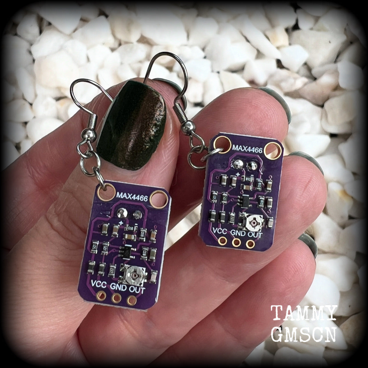 These awesome dark purple circuit board earrings measure just on 5.5cms from tip to tip, and weigh only a few grams each, these are lovely and lightweight and not too dangly.

This pair has been made on stainless steel french hooks, to be worn in pierced ears.