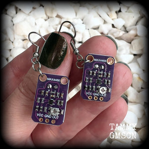 These awesome dark purple circuit board earrings measure just on 5.5cms from tip to tip, and weigh only a few grams each, these are lovely and lightweight and not too dangly.

This pair has been made on stainless steel french hooks, to be worn in pierced ears.