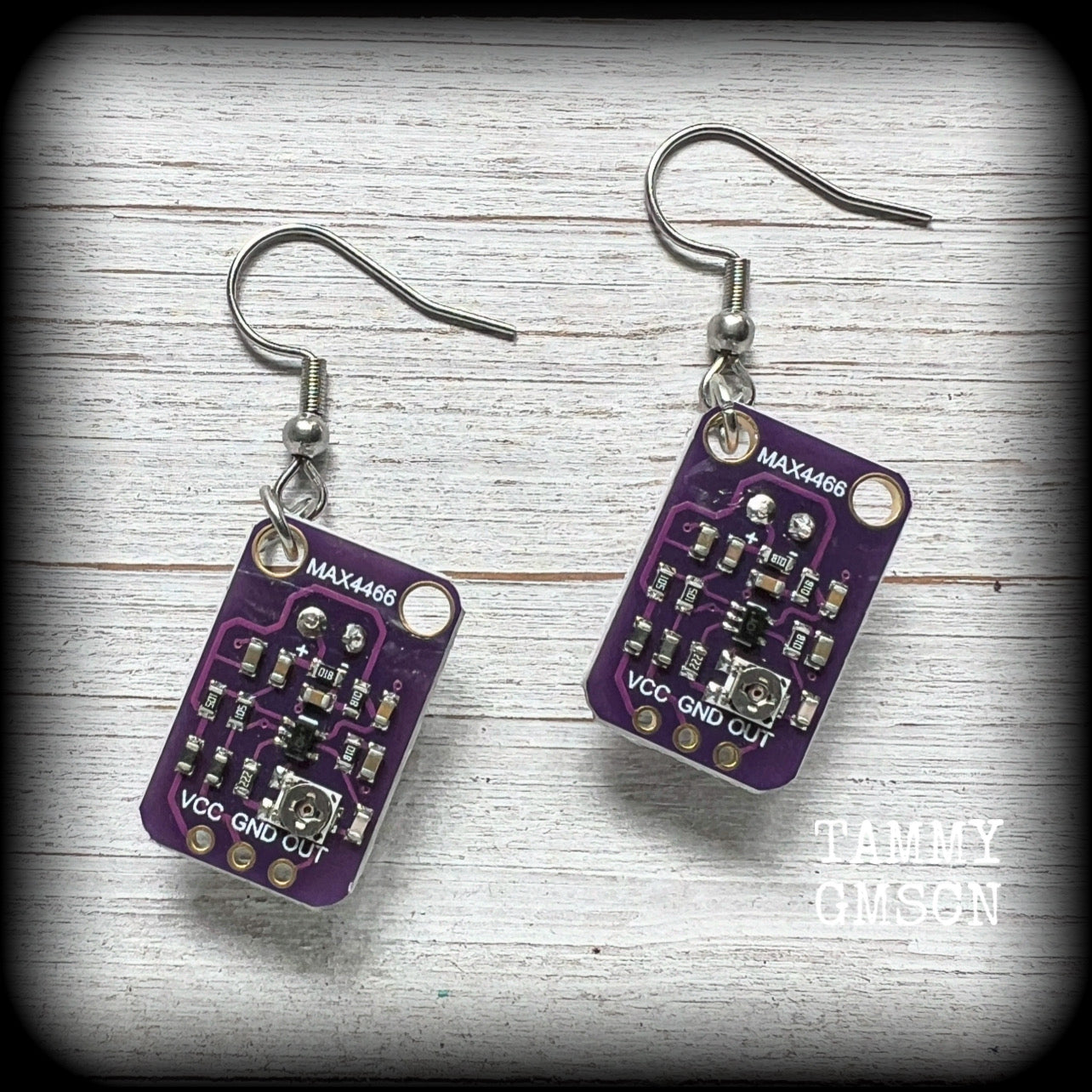 These awesome dark purple circuit board earrings measure just on 5.5cms from tip to tip, and weigh only a few grams each, these are lovely and lightweight and not too dangly.

This pair has been made on stainless steel french hooks, to be worn in pierced ears.