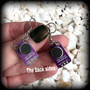 These awesome dark purple circuit board earrings measure just on 5.5cms from tip to tip, and weigh only a few grams each, these are lovely and lightweight and not too dangly.

This pair has been made on stainless steel french hooks, to be worn in pierced ears.