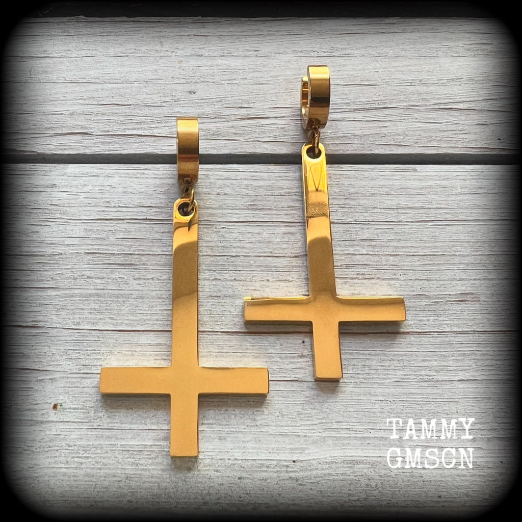 These beautiful earrings feature super shiny stainless steel inverted crosses, measuring approx 7cms from tip to tip, and are nice and light weight, at 8 grams each.

This pair have been made on huggies-suitable for pierced ears.