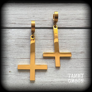 These beautiful earrings feature super shiny stainless steel inverted crosses, measuring approx 7cms from tip to tip, and are nice and light weight, at 8 grams each.

This pair have been made on huggies-suitable for pierced ears.