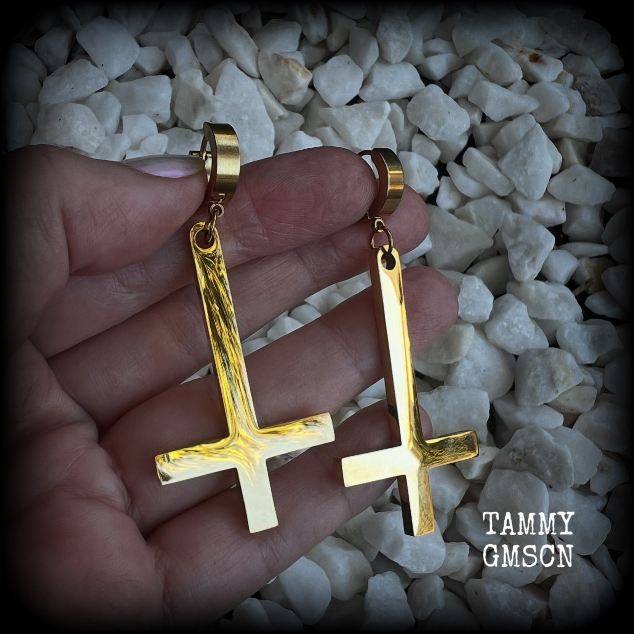 These beautiful earrings feature super shiny stainless steel inverted crosses, measuring approx 7cms from tip to tip, and are nice and light weight, at 8 grams each.

This pair have been made on huggies-suitable for pierced ears.