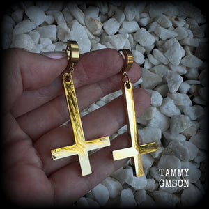 These beautiful earrings feature super shiny stainless steel inverted crosses, measuring approx 7cms from tip to tip, and are nice and light weight, at 8 grams each.

This pair have been made on huggies-suitable for pierced ears.