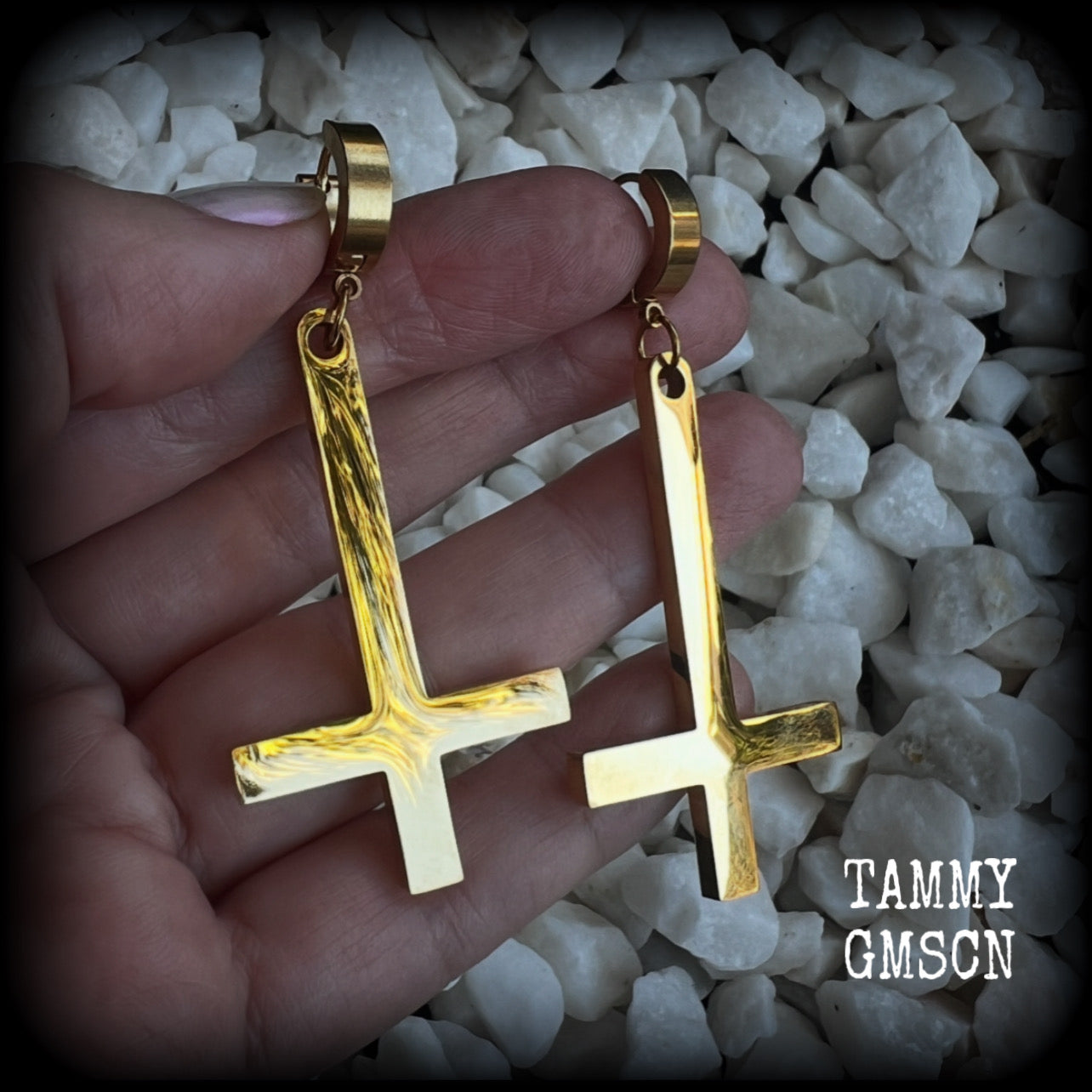 These beautiful earrings feature super shiny stainless steel inverted crosses, measuring approx 7cms from tip to tip, and are nice and light weight, at 8 grams each.

This pair have been made on huggies-suitable for pierced ears.