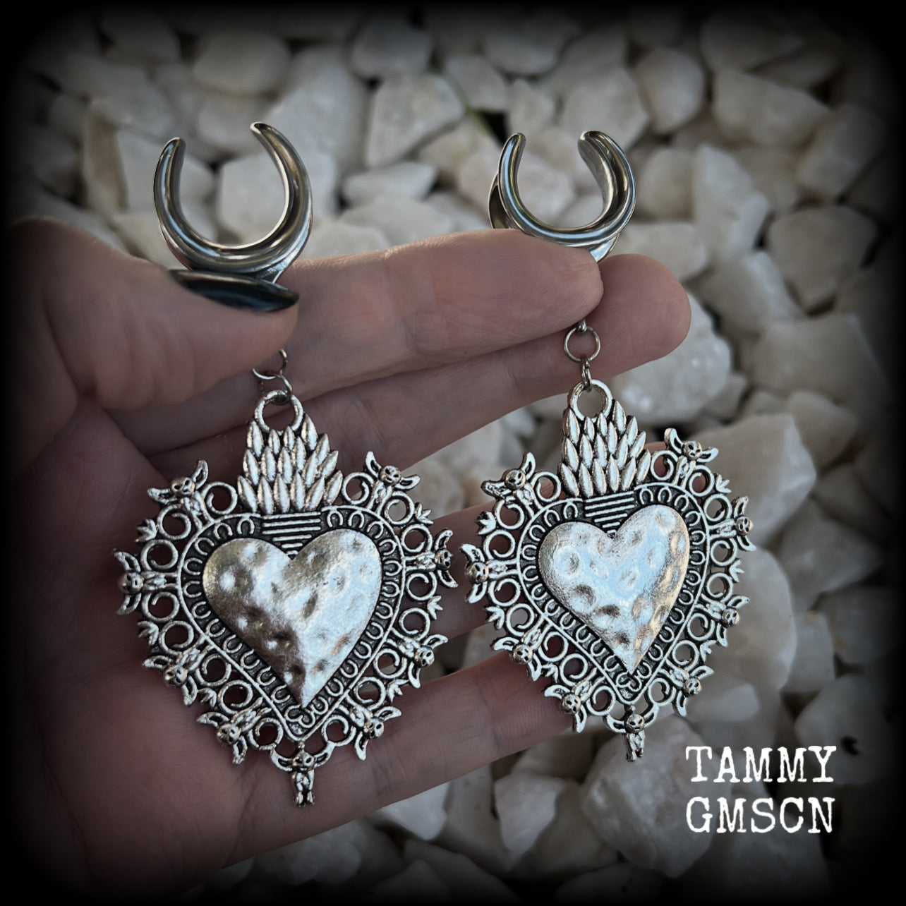 These gorgeous antique silver gauged earrings feature big beautiful sacred hearts, measuring 9cms from tip to tip, and weighing approx 14 grams each.  This pair has been made on 5/8” gauge (16mm) surgical steel cradles, to be worn in stretched lobes.