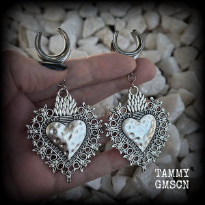 These gorgeous antique silver gauged earrings feature big beautiful sacred hearts, measuring 9cms from tip to tip, and weighing approx 14 grams each.  This pair has been made on 5/8” gauge (16mm) surgical steel cradles, to be worn in stretched lobes.
