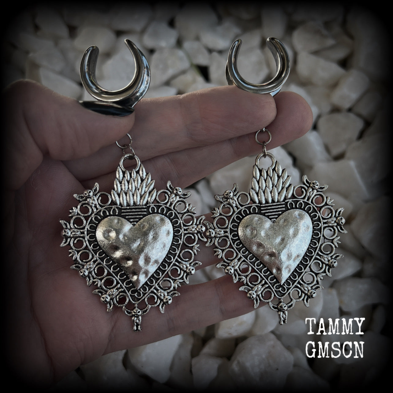 These gorgeous antique silver gauged earrings feature big beautiful sacred hearts, measuring 9cms from tip to tip, and weighing approx 14 grams each.  This pair has been made on 5/8” gauge (16mm) surgical steel cradles, to be worn in stretched lobes.