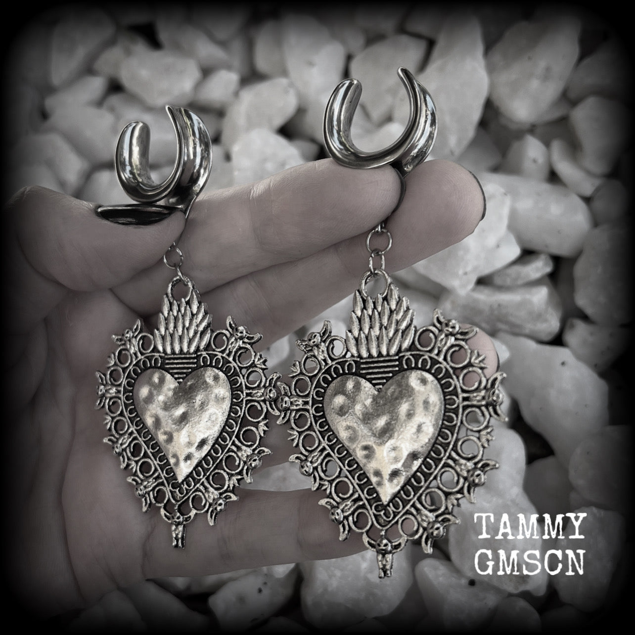 These gorgeous antique silver gauged earrings feature big beautiful sacred hearts, measuring 9cms from tip to tip, and weighing approx 14 grams each.  This pair has been made on 5/8” gauge (16mm) surgical steel cradles, to be worn in stretched lobes.