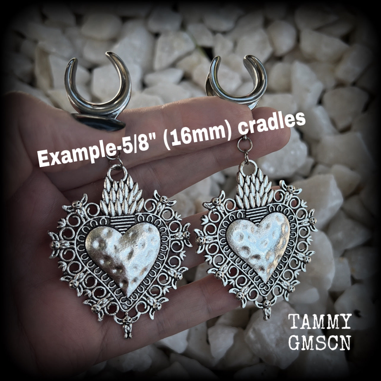 These gorgeous antique silver gauged earrings feature big beautiful sacred hearts, measuring 9cms from tip to tip, and weighing approx 14 grams each.  This pair has been made on 5/8” gauge (16mm) surgical steel cradles, to be worn in stretched lobes.