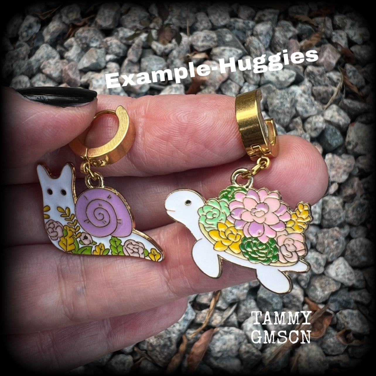These adorable earrings feature antique gold and enamel garden snails and turtles with floral embellishments, are nice and lightweight at only a few grams each, and measure in at approx 4cm from tip to tip.

This pair have been made on stainless steel huggie ear cuffs, suitable for pierced ears.

