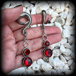 These beautiful dangly gauged earrings feature gorgeous deep red faceted garnet gemstones in an ornate antique silver setting, measuring just on 8cms from tip to tip, and weigh approx 19 grams each.  This pair have been made with 0 gauge (8mm) surgical steel full curl hooks, to be worn in stretched lobes.