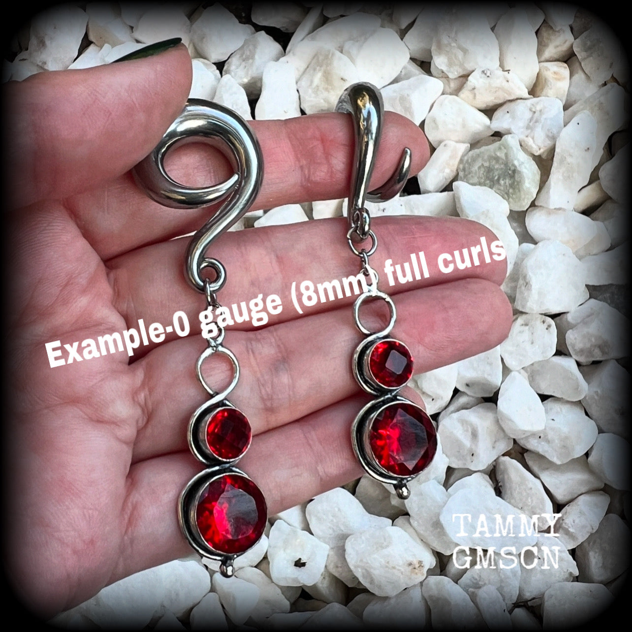 These beautiful dangly gauged earrings feature gorgeous deep red faceted garnet gemstones in an ornate antique silver setting, measuring just on 8cms from tip to tip, and weigh approx 19 grams each.  This pair have been made with 0 gauge (8mm) surgical steel full curl hooks, to be worn in stretched lobes.