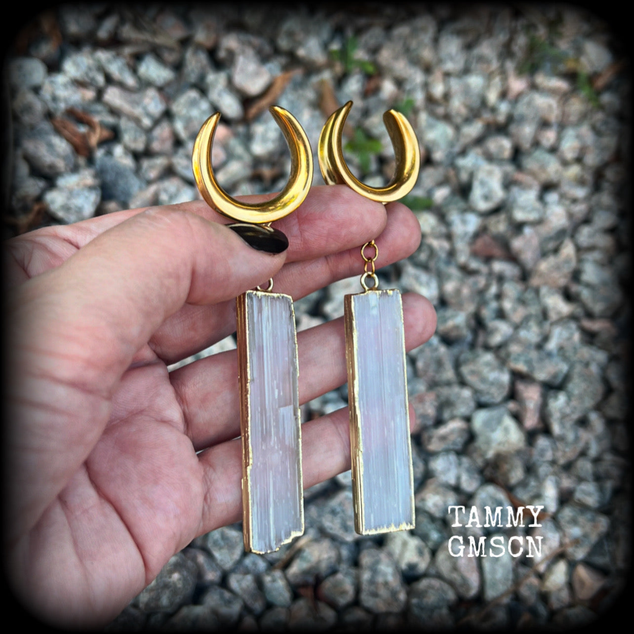 Measuring just over 10 from tip to tip, and weighing around 14 grams each a piece, these Selenite gauged earrings are simply beautiful!

This pair has been made on 7/8” gauge (22mm) surgical steel cradles, to be worn in stretched lobes.