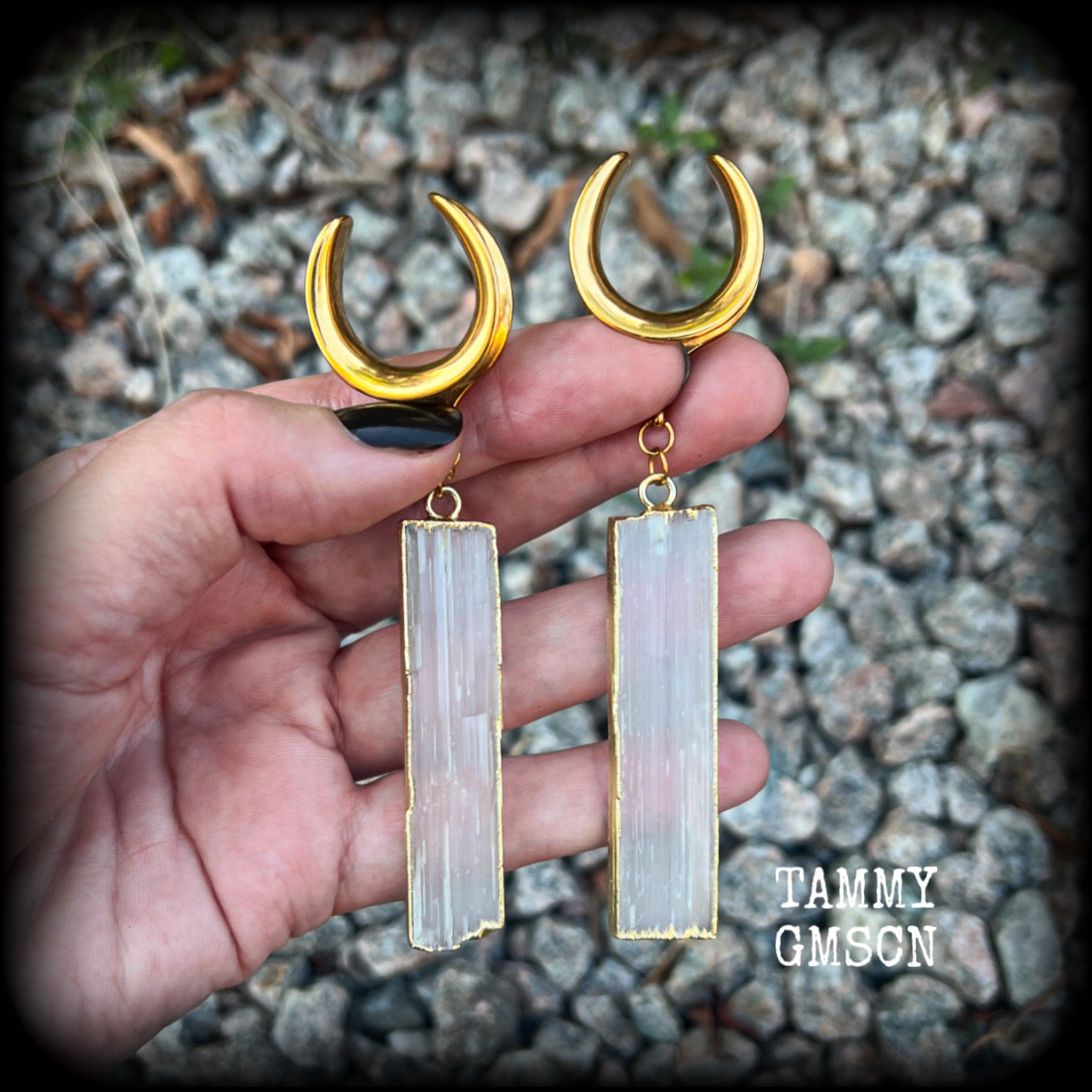 Measuring just over 10 from tip to tip, and weighing around 14 grams each a piece, these Selenite gauged earrings are simply beautiful!

This pair has been made on 7/8” gauge (22mm) surgical steel cradles, to be worn in stretched lobes.