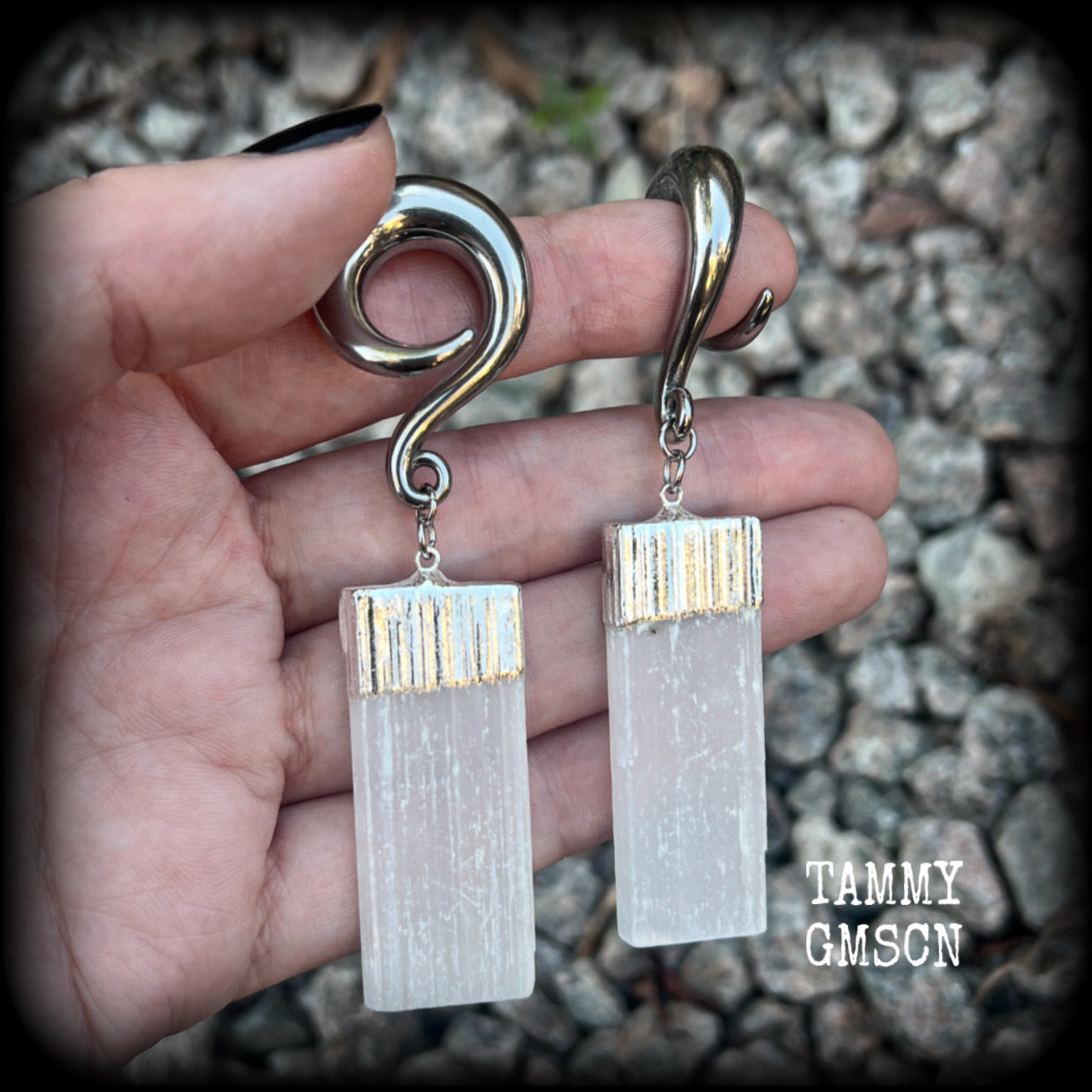 These beautiful gauged earrings feature gorgeous selenite pieces, measuring just under 9cms from tip to tip, and weighing approx 22 grams each.

This pair have been made on 0 gauge (8mm) surgical steel full curl hooks, to be worn in stretched lobes.
