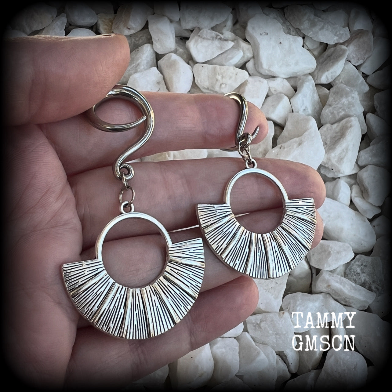 Inspired by Ishtar, Mesopotamian Goddess of love, beauty, sex and war, these unique ethnic inspired gauged earrings feature lovely dangly antique silver battle shields, nice and lightweight at approx 6 grams each, and nice and dangly at 6.5 cms from tip to tip.

This pair has been made on 6 gauge (4mm) surgical steel full curl hooks, to be worn in stretched lobes.