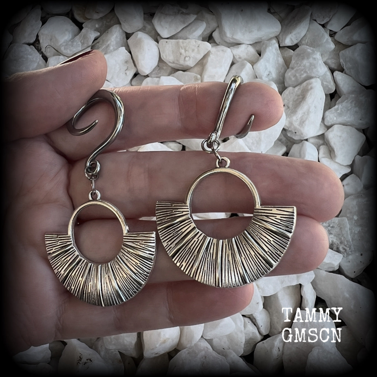 Inspired by Ishtar, Mesopotamian Goddess of love, beauty, sex and war, these unique ethnic inspired gauged earrings feature lovely dangly antique silver battle shields, nice and lightweight at approx 6 grams each, and nice and dangly at 6.5 cms from tip to tip.

This pair has been made on 6 gauge (4mm) surgical steel full curl hooks, to be worn in stretched lobes.