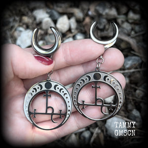 These gorgeous stainless steel earrings feature the Sigil of Lilith surrounded by moon phases, lovely and light weight at only 9 grams each, and measure just over 7cms from tip to tip.  This pair has been made on 5/8” gauge (16mm) surgical steel cradles, for stretched lobes.