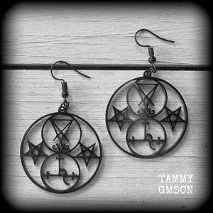 These gorgeous stainless steel earrings feature the Sigil of Lilith with the Sigil of Lucifer flanked by inverted pentagrams on each side. These earrings are lovely and light weight, weighing approx only a gram or two each, and measure just on 6 cms from tip to tip.

This pair has been made with french hooks, for pierced ears.
