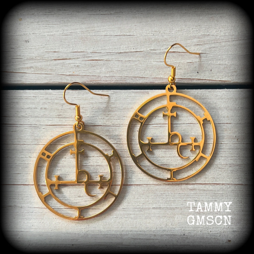 
These gorgeous gold stainless steel earrings feature the Sigil of Lilith as it appears in The Lesser Key of Solomon, and are lovely and light weight, weighing only a few grams each, and measure just on 5.5cms from tip to tip.

This pair has been made with french hooks, suitable for pierced ears.