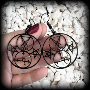 These gorgeous stainless steel earrings feature the Sigil of Lilith with the Sigil of Lucifer flanked by inverted pentagrams on each side. These earrings are lovely and light weight, weighing approx only a gram or two each, and measure just on 6 cms from tip to tip.  This pair has been made with french hooks, for pierced ears.