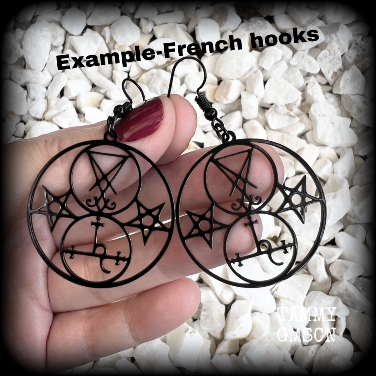 These gorgeous stainless steel earrings feature the Sigil of Lilith with the Sigil of Lucifer flanked by inverted pentagrams on each side. These earrings are lovely and light weight, weighing approx only a gram or two each, and measure just on 6 cms from tip to tip.  This pair has been made with french hooks, for pierced ears.