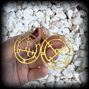 These gorgeous gold stainless steel earrings feature the Sigil of Lilith as it appears in The Lesser Key of Solomon, and are lovely and light weight, weighing only a few grams each, and measure just on 5.5cms from tip to tip.

This pair has been made with french hooks, suitable for pierced ears.