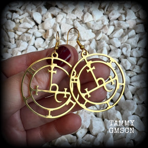 These gorgeous gold stainless steel earrings feature the Sigil of Lilith as it appears in The Lesser Key of Solomon, and are lovely and light weight, weighing only a few grams each, and measure just on 5.5cms from tip to tip.

This pair has been made with french hooks, suitable for pierced ears.